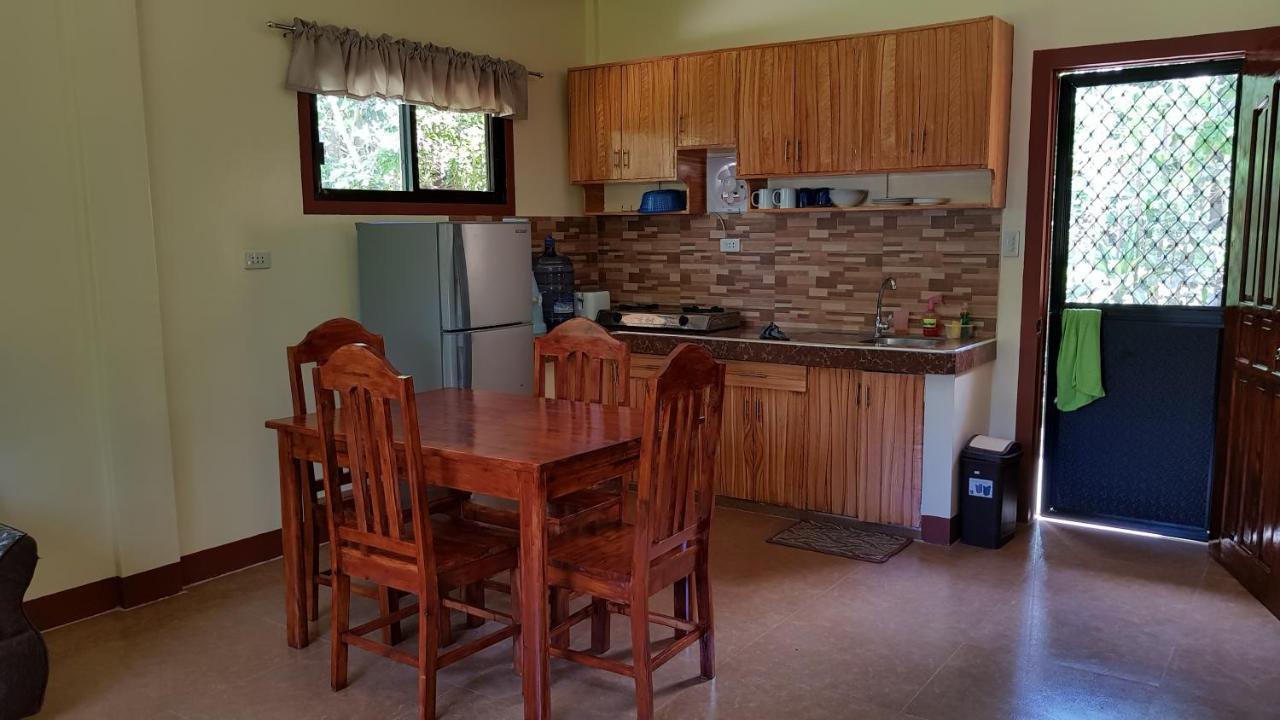 Paco'S Garden Home Stay Мамбахао Экстерьер фото