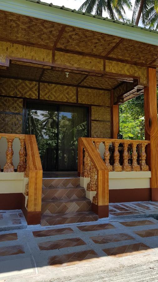 Paco'S Garden Home Stay Мамбахао Экстерьер фото