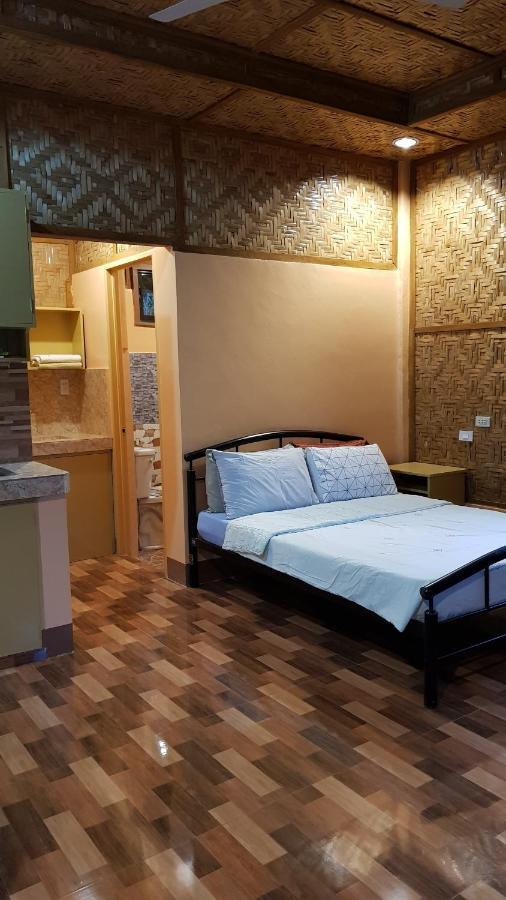 Paco'S Garden Home Stay Мамбахао Экстерьер фото