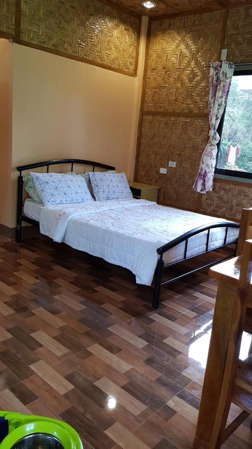 Paco'S Garden Home Stay Мамбахао Экстерьер фото