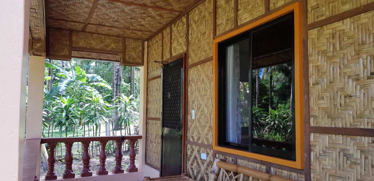 Paco'S Garden Home Stay Мамбахао Экстерьер фото