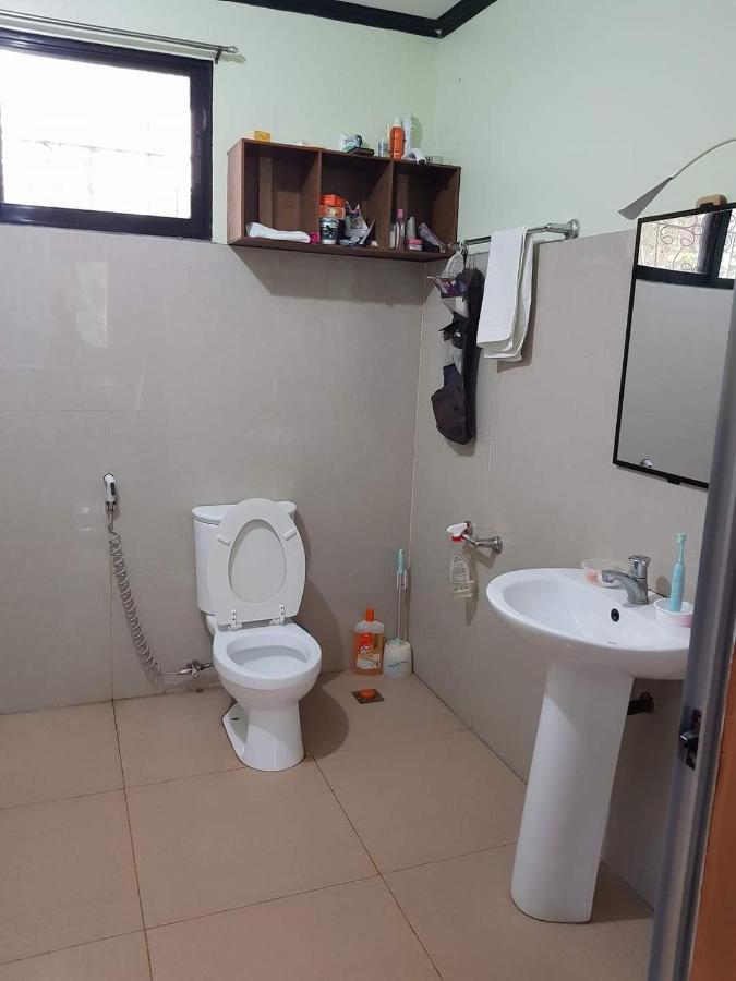 Paco'S Garden Home Stay Мамбахао Экстерьер фото