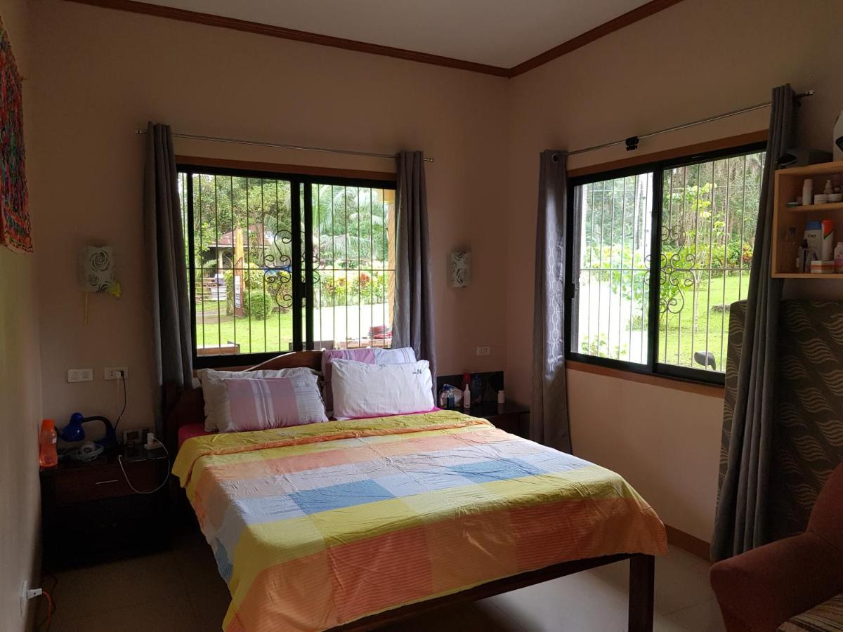 Paco'S Garden Home Stay Мамбахао Экстерьер фото