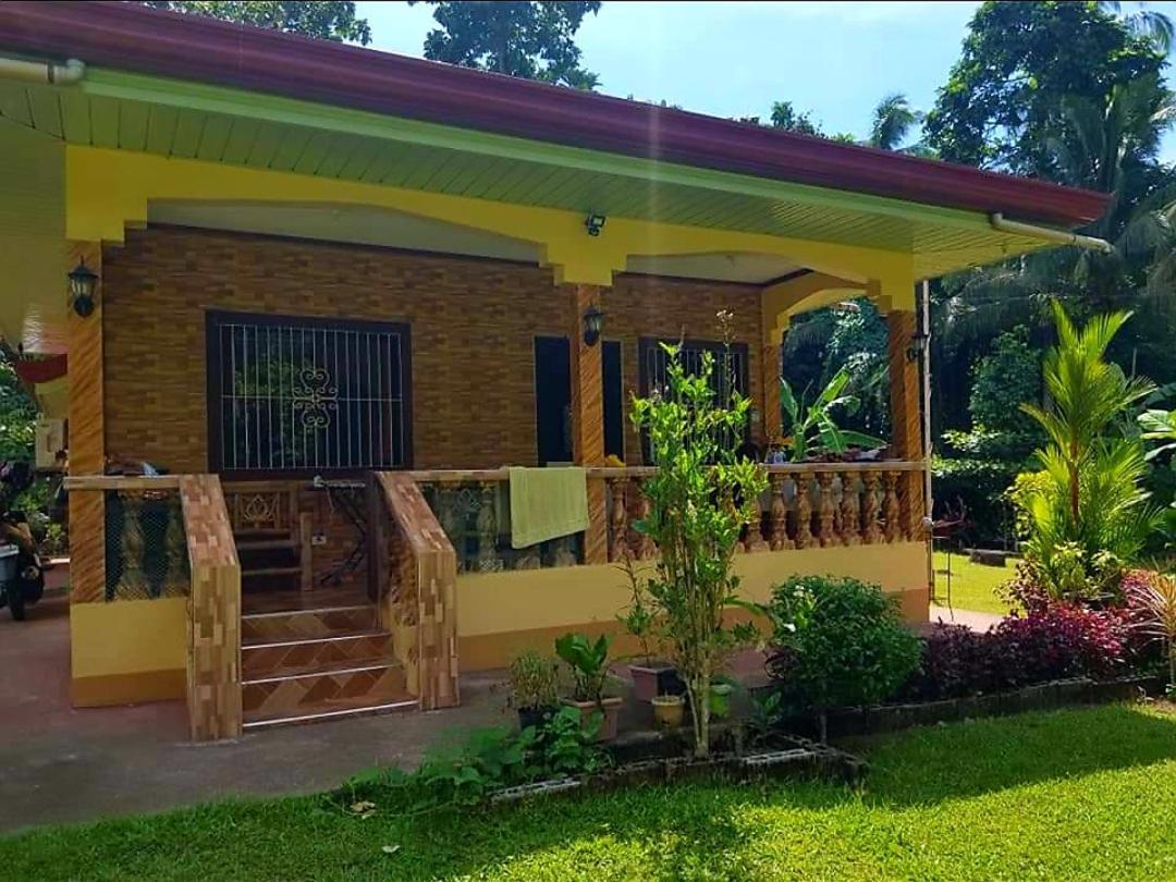 Paco'S Garden Home Stay Мамбахао Экстерьер фото