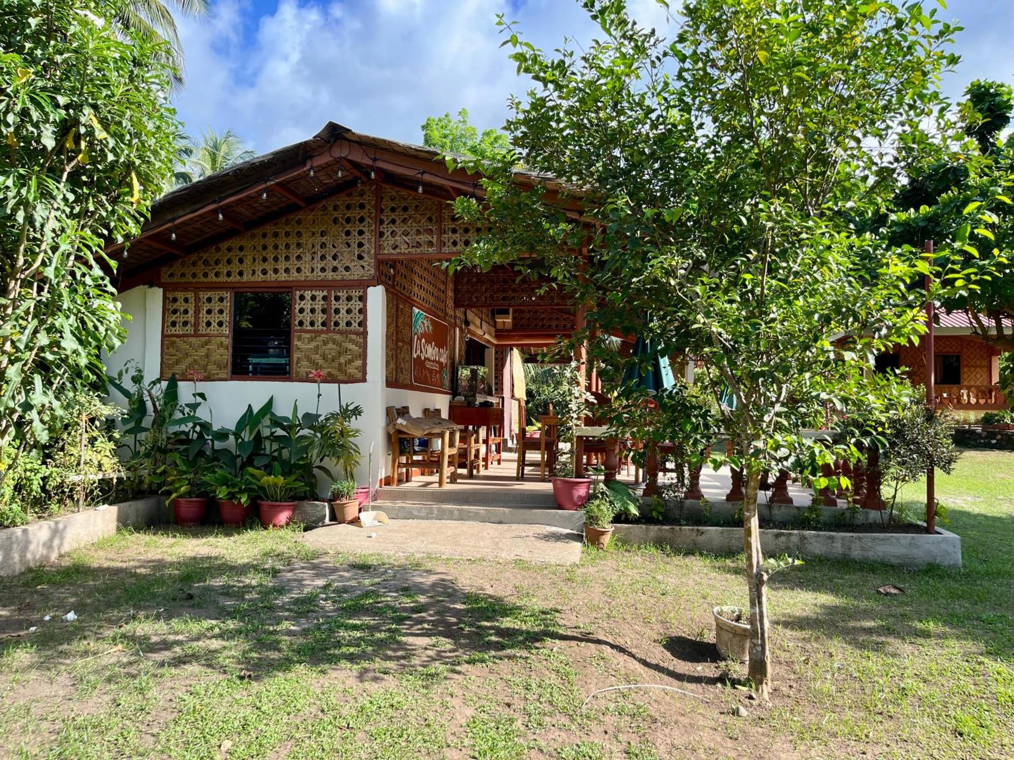 Paco'S Garden Home Stay Мамбахао Экстерьер фото