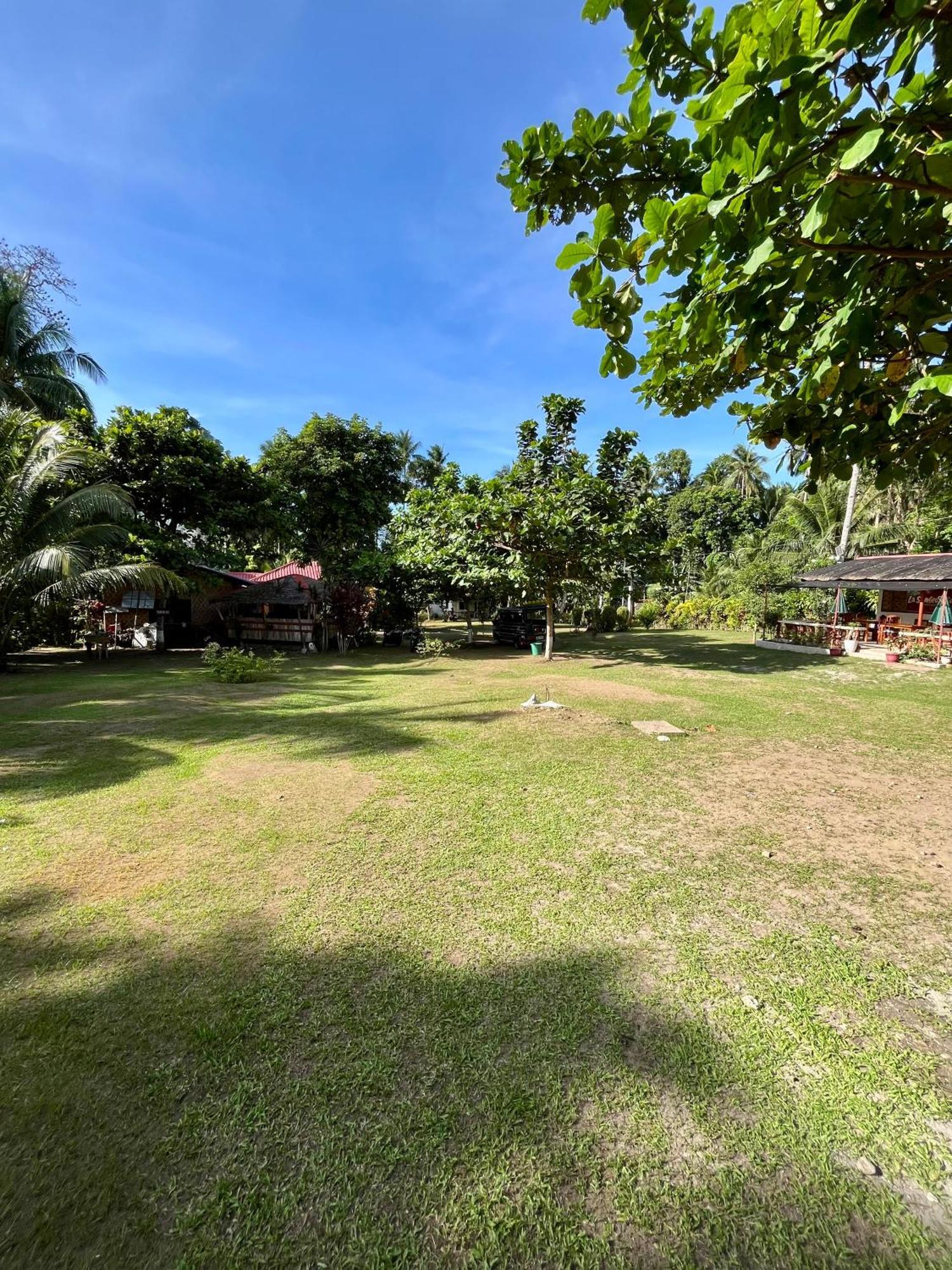 Paco'S Garden Home Stay Мамбахао Экстерьер фото