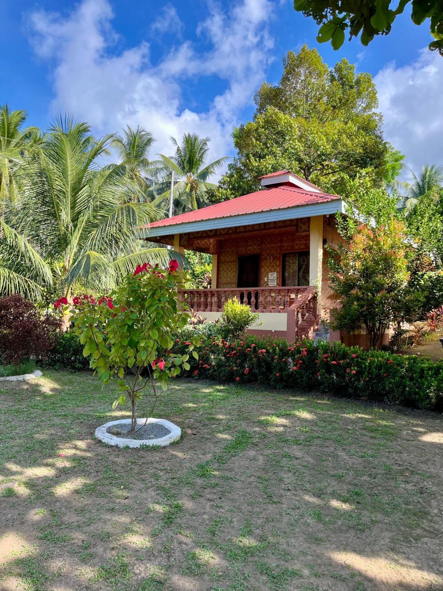 Paco'S Garden Home Stay Мамбахао Экстерьер фото